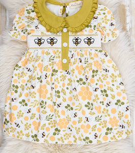 Smocked green collared bee dress