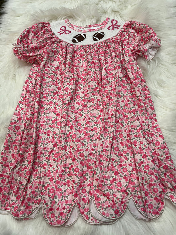 Pink bow smocked football dress