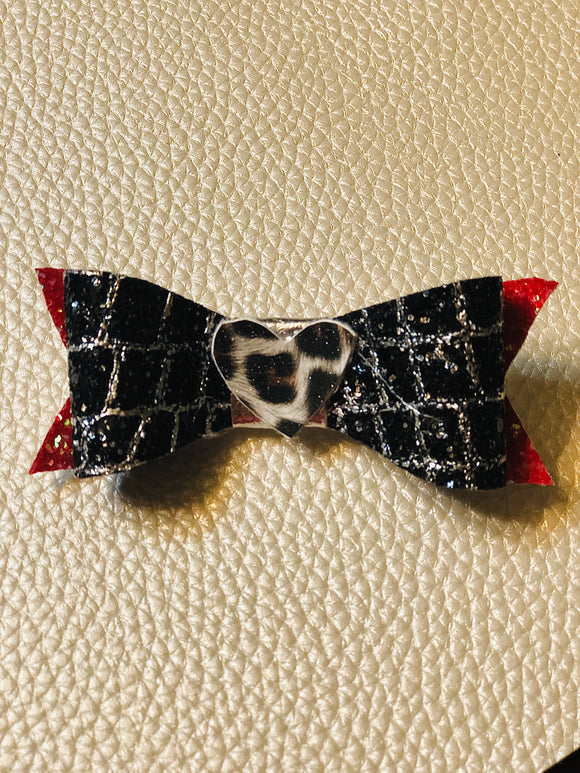 Red and black leopard heart faux leather bow on clip