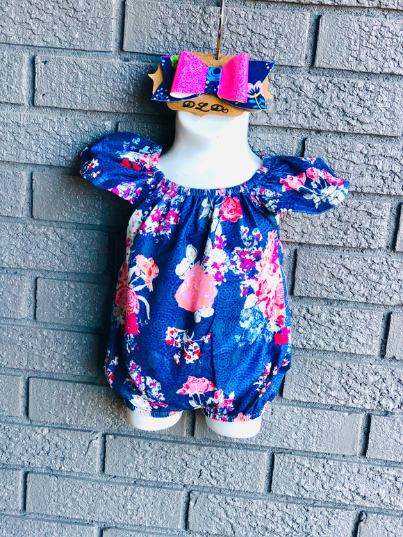 Navy floral bubble romper with bow