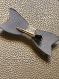 Faux leather bow with clip 3.5 inch